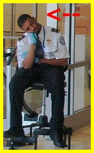 TSA agent daydreaming about his future union representation. (Photo credit: TheeErin)